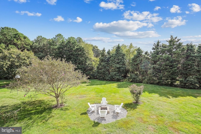 24749 Swan Rd, Saint Michaels, MD 21663 - view of green lawn featuring a fire pit