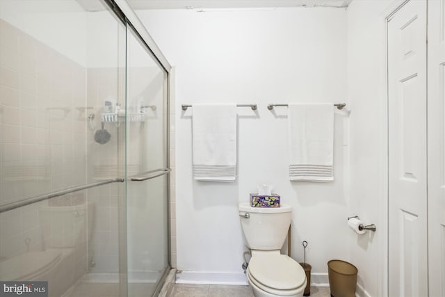 24749 Swan Rd, Saint Michaels, MD 21663 - bathroom with baseboards, a stall shower, and toilet