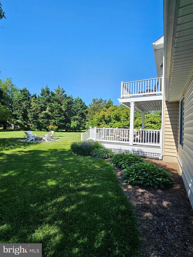 24749 Swan Rd, Saint Michaels, MD 21663 - view of grassy yard with a balcony