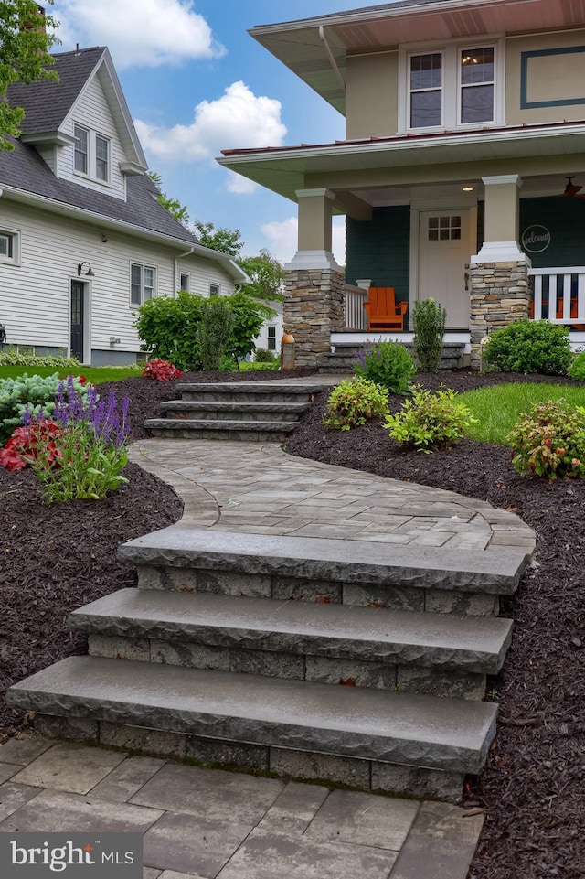 entrance to property with a porch