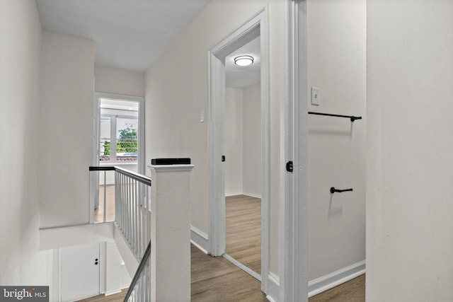 1294 Chase St, Camden, NJ 08104 - hall featuring an upstairs landing, wood finished floors, and baseboards