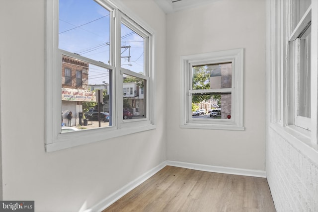 1294 Chase St, Camden, NJ 08104 - spare room featuring wood finished floors and baseboards