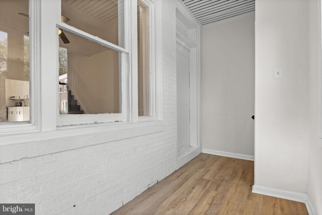 1294 Chase St, Camden, NJ 08104 - hall featuring wood finished floors, baseboards, and stairway