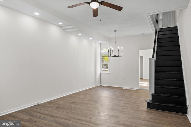 1294 Chase St, Camden, NJ 08104 - unfurnished living room featuring stairway, ceiling fan, wood finished floors, recessed lighting, and a chandelier