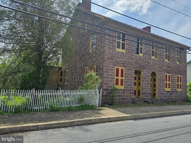 302 W Front St, Lewisberry, PA 17339 - view of front of house featuring fence and a chimney