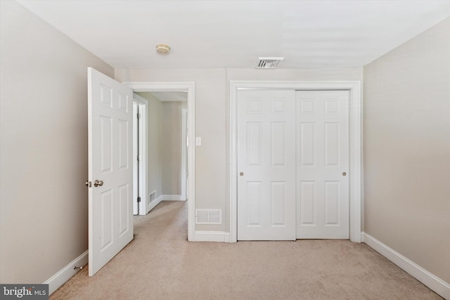 1558 Lukens Ave, Abington, PA 19001 - unfurnished bedroom featuring light carpet, baseboards, and a closet