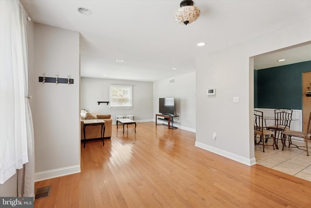 1558 Lukens Ave, Abington, PA 19001 - living room with light wood-style flooring, recessed lighting, and baseboards