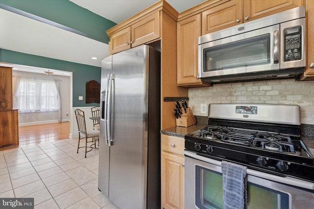 1558 Lukens Ave, Abington, PA 19001 - kitchen featuring appliances with stainless steel finishes, light tile patterned flooring, backsplash, baseboards, and recessed lighting
