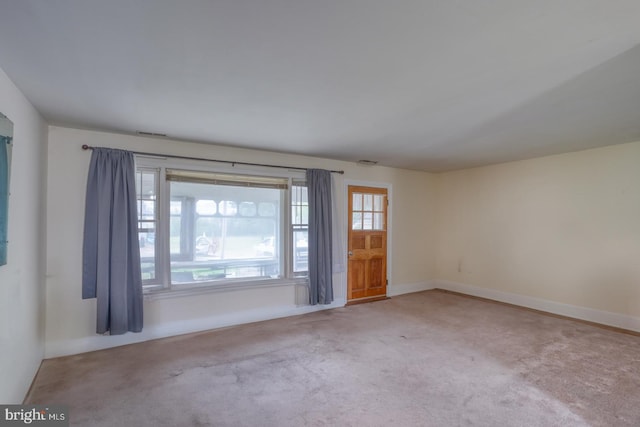 85 Woodland Ave, Ocean View, DE 19970 - carpeted empty room with baseboards