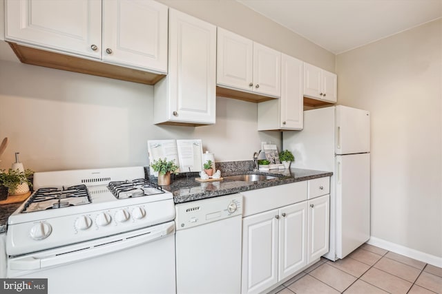 6624 Boulevard Vw Unit C1, Alexandria, VA 22307 - kitchen with white appliances, a sink, white cabinets, and light tile patterned floors