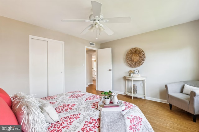 6624 Boulevard Vw Unit C1, Alexandria, VA 22307 - bedroom featuring wood finished floors, baseboards, a closet, and ceiling fan