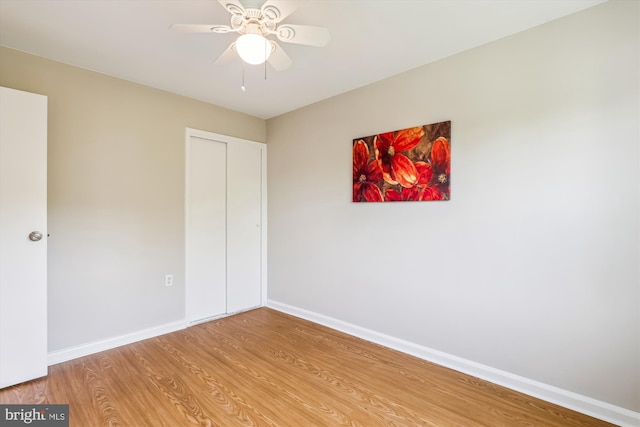 6624 Boulevard Vw Unit C1, Alexandria, VA 22307 - unfurnished bedroom with light wood-style flooring, baseboards, and ceiling fan