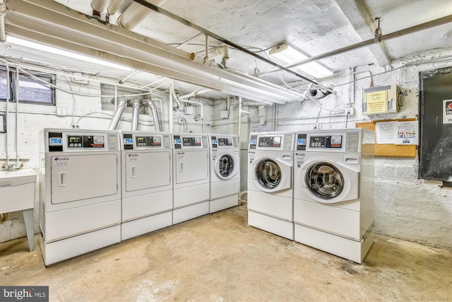6624 Boulevard Vw Unit C1, Alexandria, VA 22307 - shared laundry room with washing machine and dryer