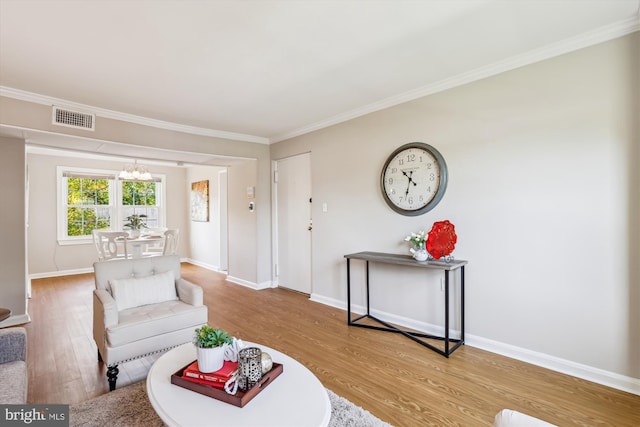 6624 Boulevard Vw Unit C1, Alexandria, VA 22307 - living area with wood finished floors, ornamental molding, baseboards, and a chandelier