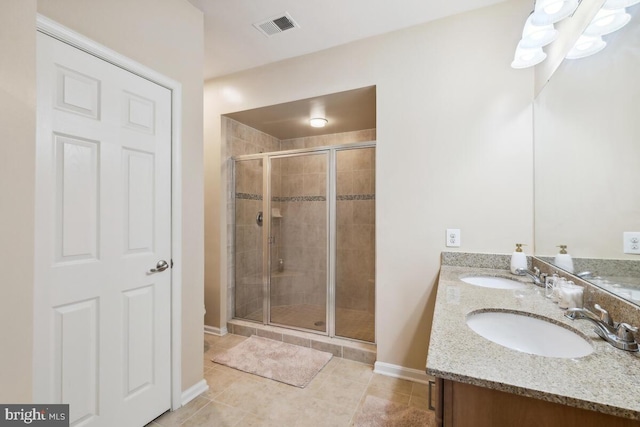 232 Urban Ave Unit 232, Gaithersburg, MD 20878 - bathroom featuring a stall shower, tile patterned flooring, baseboards, and double vanity