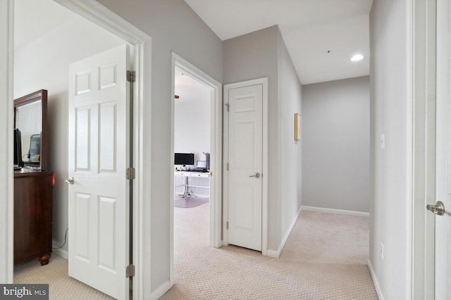 232 Urban Ave Unit 232, Gaithersburg, MD 20878 - hallway with light carpet, baseboards, and an office area
