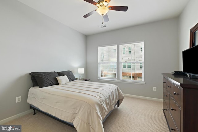232 Urban Ave Unit 232, Gaithersburg, MD 20878 - bedroom with light colored carpet, baseboards, and ceiling fan