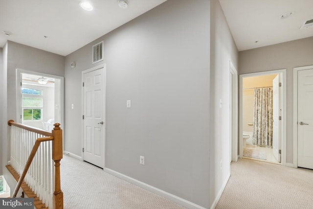 232 Urban Ave Unit 232, Gaithersburg, MD 20878 - corridor featuring an upstairs landing, carpet floors, and baseboards