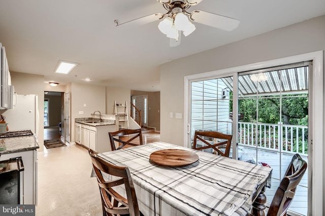 2212 Palustris Ln, Abingdon, MD 21009 - dining space featuring a ceiling fan and stairs