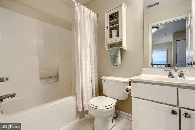 2212 Palustris Ln, Abingdon, MD 21009 - full bathroom featuring tile patterned flooring, toilet, vanity, shower / bath combination with curtain, and baseboards