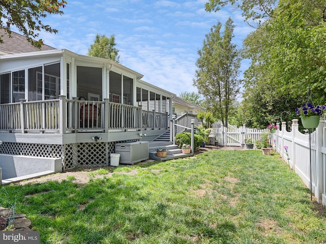 35553 Dry Brook Dr, Rehoboth Beach, DE 19971 - view of yard featuring a sunroom and a gate