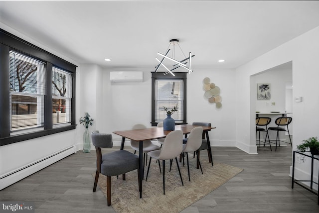 24 Cuthbert Rd, Cinnaminson, NJ 08077 - dining area with baseboard heating, a wall mounted AC, plenty of natural light, wood finished floors, and recessed lighting