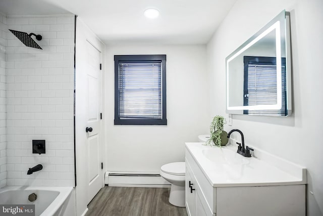 24 Cuthbert Rd, Cinnaminson, NJ 08077 - bathroom featuring a baseboard heating unit, wood finished floors, vanity, toilet, and tub / shower combination