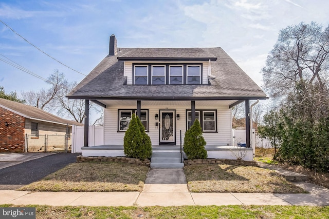 24 Cuthbert Rd, Cinnaminson, NJ 08077 - bungalow-style home featuring a gate, a porch, a chimney, fence, and a shingled roof