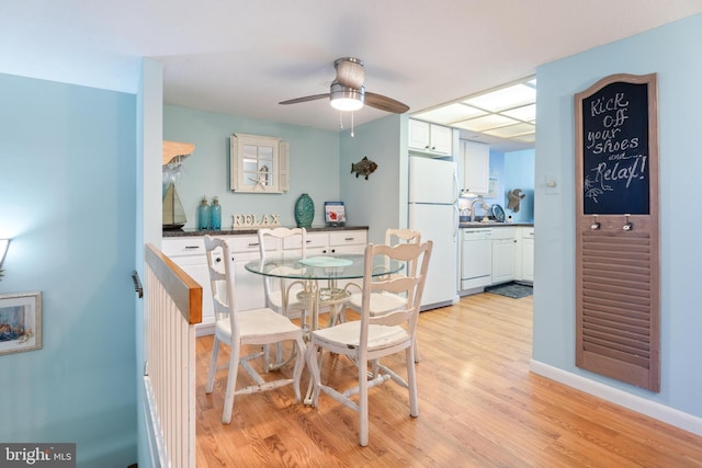 9900 Coastal Hwy Unit 1903, Ocean City, MD 21842 - dining space featuring light wood-type flooring, a ceiling fan, and baseboards