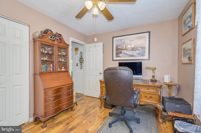 523 Zig Zag Ln, Inwood, WV 25428 - home office with a ceiling fan, light wood-type flooring, and baseboards