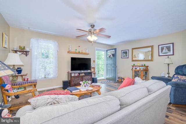 523 Zig Zag Ln, Inwood, WV 25428 - living area with wood finished floors, a ceiling fan, and baseboards