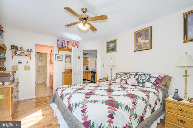 523 Zig Zag Ln, Inwood, WV 25428 - bedroom featuring light wood-style flooring, ensuite bathroom, ceiling fan, and baseboards