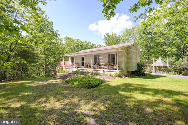 523 Zig Zag Ln, Inwood, WV 25428 - back of house with a lawn