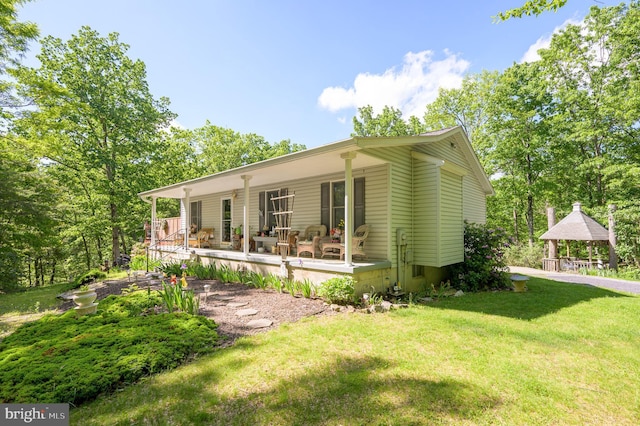 523 Zig Zag Ln, Inwood, WV 25428 - view of front of property with covered porch, a gazebo, and a front lawn