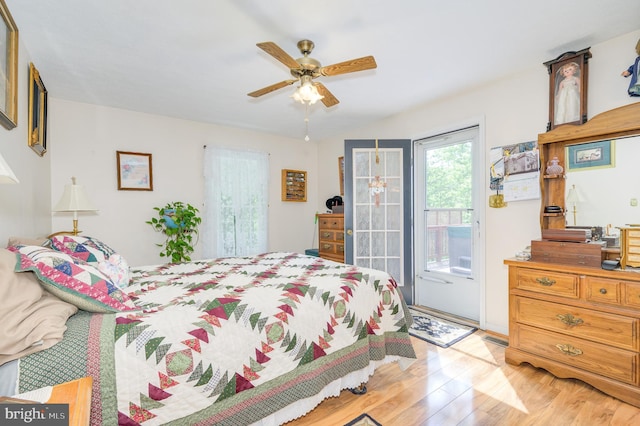 523 Zig Zag Ln, Inwood, WV 25428 - bedroom featuring light wood-style floors, access to exterior, and a ceiling fan