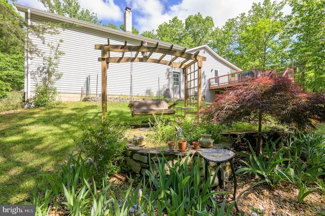 523 Zig Zag Ln, Inwood, WV 25428 - view of green lawn featuring a pergola and a wooden deck