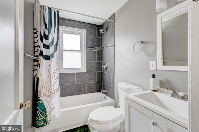 full bathroom with toilet, shower / bath combo, and vanity