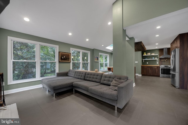 329 Dickinson Ave, Swarthmore, PA 19081 - living room with recessed lighting, baseboards, and high vaulted ceiling