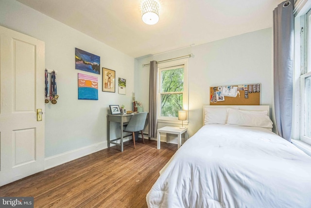 329 Dickinson Ave, Swarthmore, PA 19081 - bedroom with dark wood finished floors and baseboards