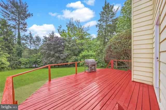 329 Dickinson Ave, Swarthmore, PA 19081 - wooden deck featuring a lawn, a grill, and a view of trees