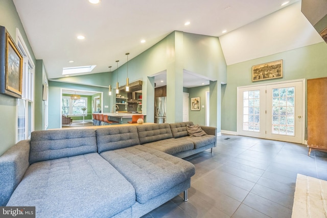329 Dickinson Ave, Swarthmore, PA 19081 - living room with a skylight, recessed lighting, and high vaulted ceiling
