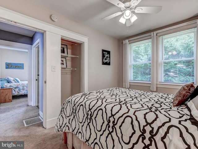 3932 Glenhurst Rd, Baltimore, MD 21222 - bedroom with carpet floors, a closet, and a ceiling fan