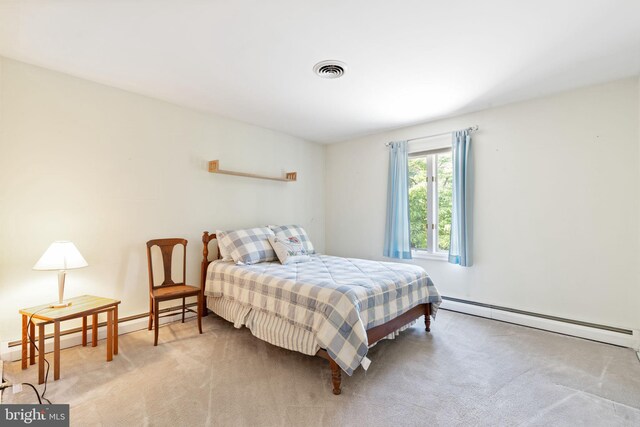 60 S Forge Manor Dr, Phoenixville, PA 19460 - carpeted bedroom featuring a baseboard heating unit and a baseboard radiator
