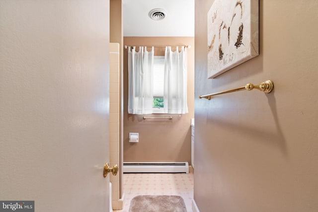 60 S Forge Manor Dr, Phoenixville, PA 19460 - entryway featuring a baseboard heating unit, baseboards, and tile patterned floors
