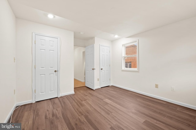 901 W Barre St, Baltimore, MD 21230 - unfurnished bedroom with baseboards, wood finished floors, and recessed lighting