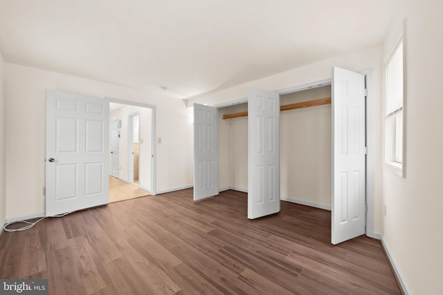 901 W Barre St, Baltimore, MD 21230 - unfurnished bedroom with wood finished floors and baseboards