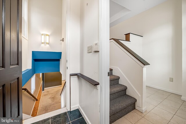 901 W Barre St, Baltimore, MD 21230 - stairway with tile patterned floors and baseboards