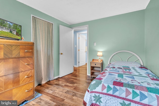 7570 Independence Cir, Charlotte Hall, MD 20622 - bedroom featuring wood finished floors and ornamental molding