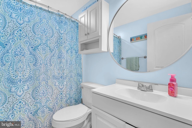7570 Independence Cir, Charlotte Hall, MD 20622 - full bath featuring vanity, toilet, and curtained shower