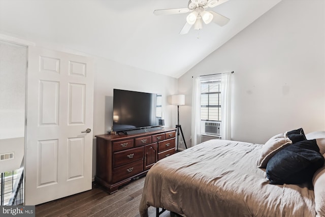 bedroom featuring dark wood-style floors, lofted ceiling, and a ceiling fan